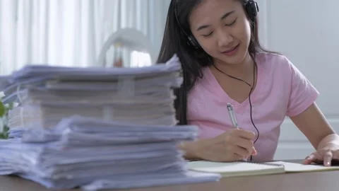 Work from home concept of 4k Resolution. Young Asian women are working hard a Stock Footage 144622263