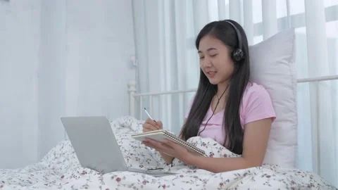 Work from home concept. Asian young woman communicating video call through no Stock Footage 140543965