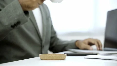 Work from home concept. Close up. Asian male business wear a suit work at home s Stock Footage 144515678