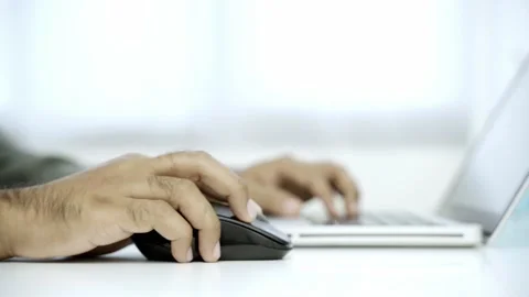Work from home concept. Close up. Asian male wear a white shirt work at home sit Stock Footage 144515900