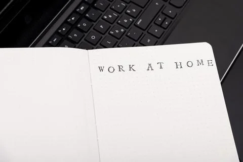Work from home concept. Man working with a laptop during home quarantine to.. Stock Photos
