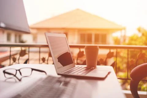 Work from Home Concept, Working table at Home with Computer Monitor and Lapto Stock Photos