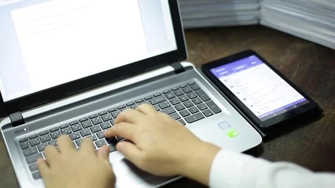 Work from home connect to database with tablet  Stock Footage 76787048