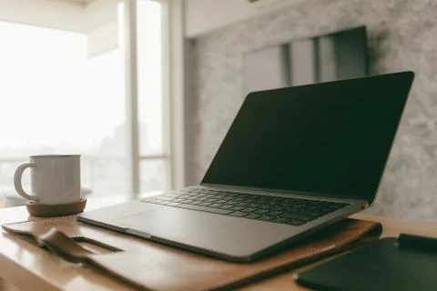 Work from home creative items set of a laptop and pen tablet in the apartment. Stockfoto's