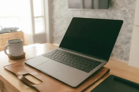 Work from home creative items set of a laptop and pen tablet in the apartment. Фото