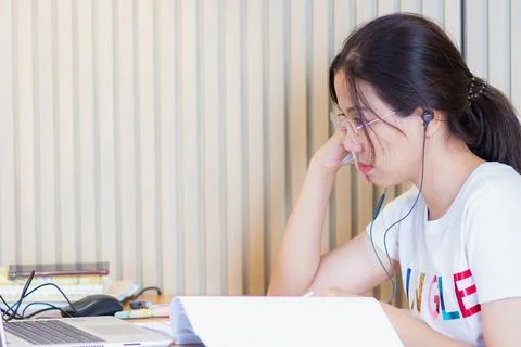 Work from home during the outbreak of the virus. Attractive young woman wor.. Stock Photos