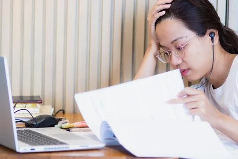 Work from home during the outbreak of the virus. Attractive young woman wor.. Stock Photos