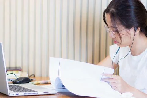 Work from home during the outbreak of the virus. Attractive young woman wor.. Stock Photos