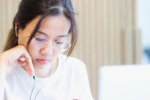 Work from home during the outbreak of the virus. Attractive young woman wor.. Stock Photos