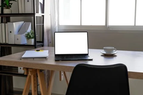 Work from home minimal workspace concept with blank laptop screen mockup on.. Stock Photos