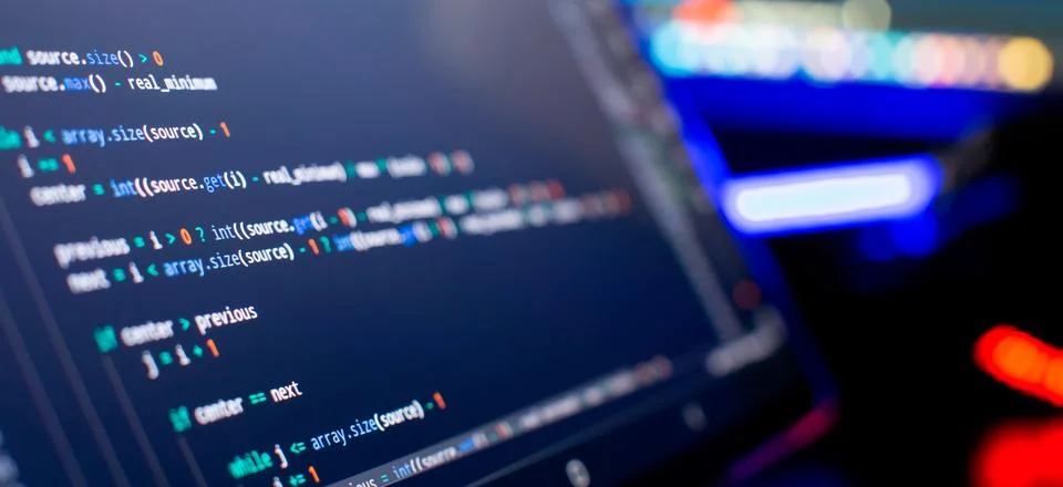 Work from home. Programmer coding code on notebook screen at home. Stockfoto's