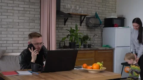 Work-From-Home Workflow With Children. Remote working parents Stock Footage 148188457