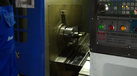 Work includes machine with computer control. Stock Footage 49432271