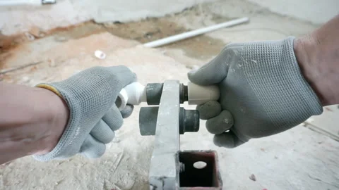 Work on the installation of heating or plumbing. Stock Footage 263757593