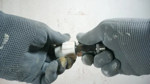 Work on the installation of heating or plumbing. Stock Footage 263761293