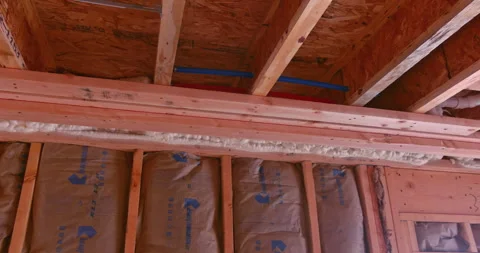 Work on insulation wall of a new residential building Stock-Footage 266141641