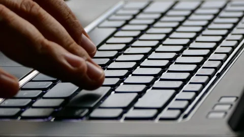 Work on the keyboard of a laptop or computer. Type the text on the keyboard. Video stock 91089898