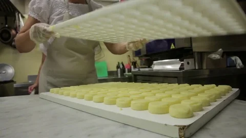 Work in the kitchen, cook prepares the dumplings Stock Footage 82176271