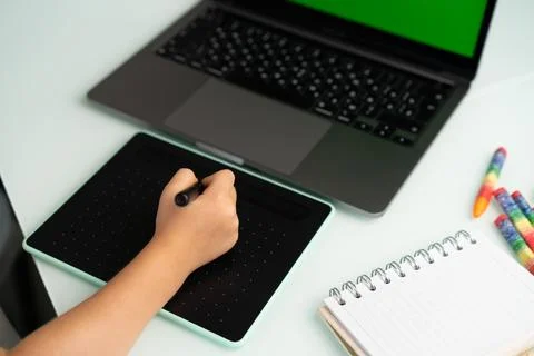 Work at a laptop and a graphics tablet Foto stock
