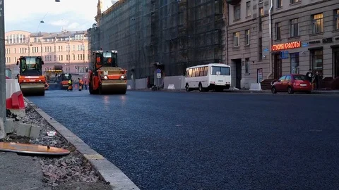 Work on laying asphalt roller Stock Footage 116997556