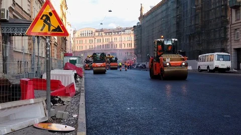 Work on laying asphalt roller Stock Footage 117065449