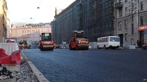 Work on laying asphalt roller Stock Footage 117065767