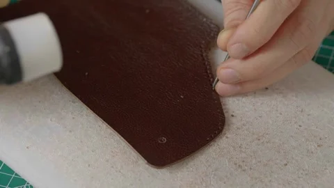Work with leather, handmade. Stock Footage 332083020