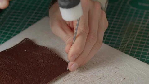 Work with leather, handmade. Stock Footage 332083046