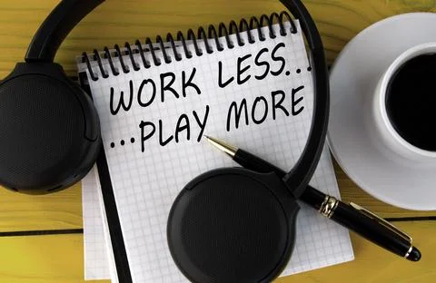 WORK LESS ... PLAY MORE - words on a white notepad on a yellow background w.. Stock Photos