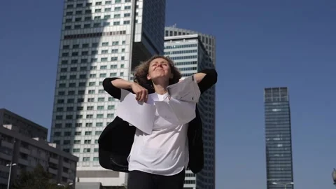Work life balance concept. Young female employee throws in the air her papers in Stock Footage 140603685