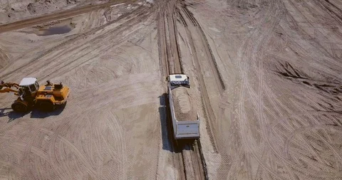 The work of loading equipment in the sand quarry Stock Footage 129738869