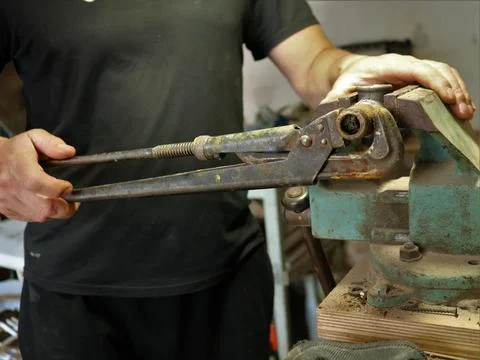 Work of a locksmith on a workbench Stock Photos
