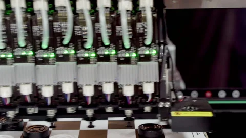 The work of the machine for placing checkers on the playing field. Stock Footage 153310613