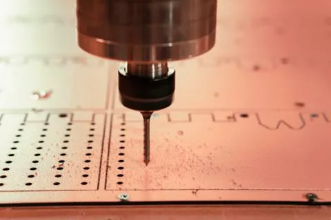 Work of the machine tool with numerical control. Closeup of a spindle. Stock Photos