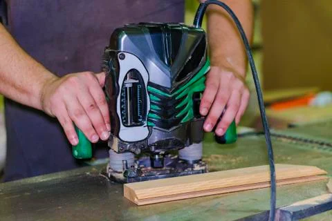 Work with a manual electric milling machine. Foto stock