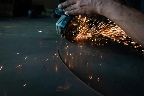 Work with a manual grinding machine Stock Photos