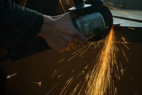 Work with a manual grinding machine Stock Photos