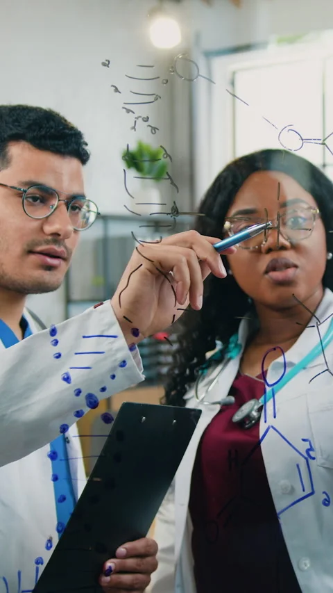 Work in medical lab of good-looking purposeful professional multiracial african  Stock Footage 329320813