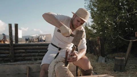 Work of the medieval carpenter with hand tools and wood Stock Footage 79997285