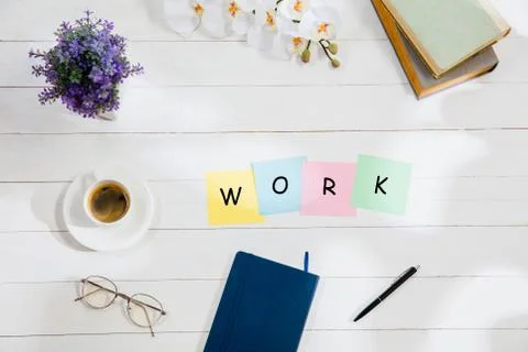 WORK. Message at colorful note papers on a desk background. Stock Illustration