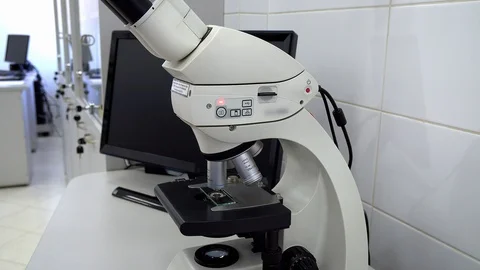Work with a microscope Stock-Footage 121048037