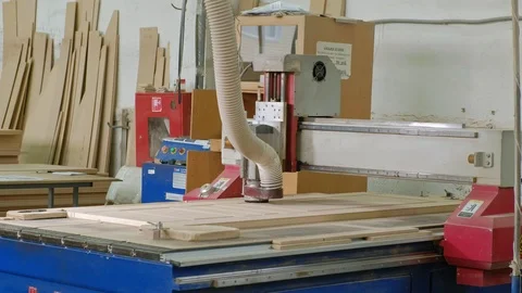 Work of the milling machine, prepares wooden blanks for the door, the production Stock Footage 100432772