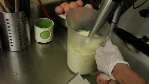 Work at the mixer in the kitchen of a restaurant Stock Footage 82176297
