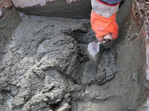 Work with mortar at a construction site Stock Photos