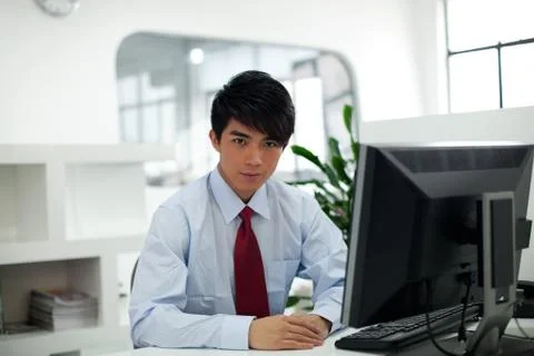 Work Network Desk Sitting 20 to 30. Office supplies Business Confidence Office Stock Photos