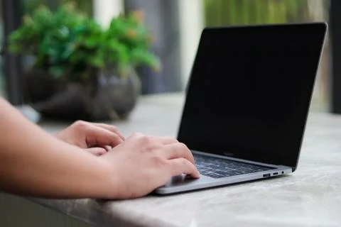 Work on the notebook after the color is off. Stock Photos