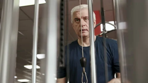 Work Out of 50s or 60s Old Male at Gym Close Up. Sport Equipment for Exercise In Stock Footage 199478570