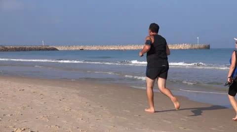 Work out at the beach Stock Footage 12189380