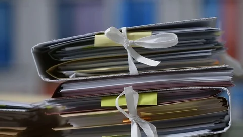 Work overload and stacks of paperwork Vídeos de archivo 86127357