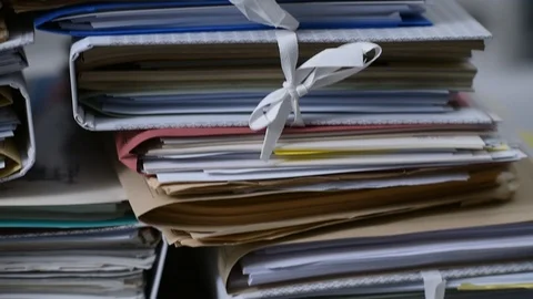 Work overload and stacks of paperwork Stock Footage 86127426